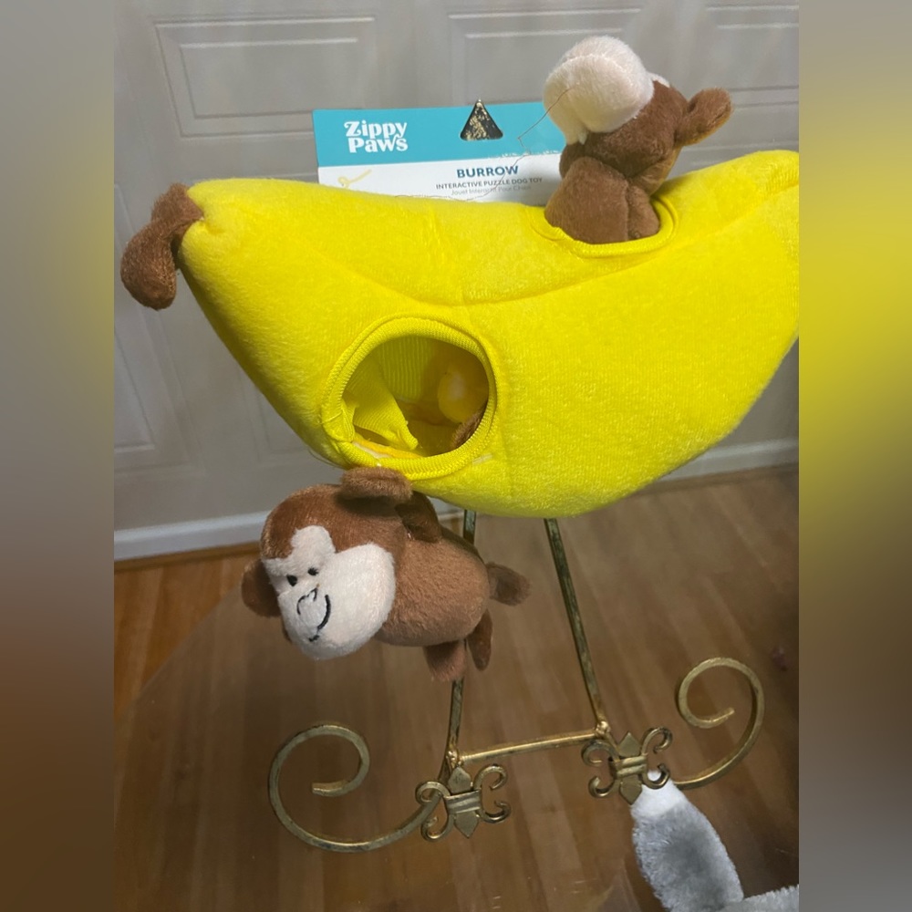 - Zippy Paws Banana With Monkes  10”With Squeaker.